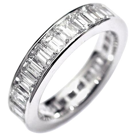 Customizable Platinum Emerald Cut Diamond Channel Set Eternity Ring