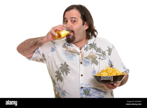 Fat Bearded Caucasian Man Drinking Beer And Holding Bowl Of Chip Stock