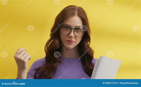 Medium Shot Of Flirting Cute Brunette In Big Glasses Holding Spring