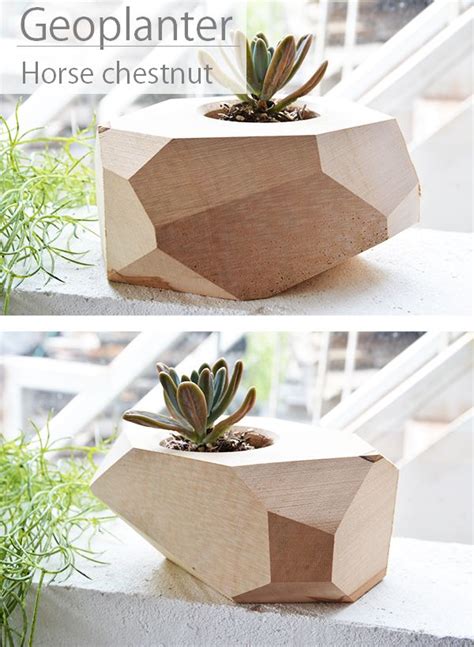 "Geoplanter" A wooden planter (walnut) of geometric shape for interior ...