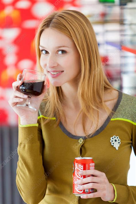 Woman Drinking A Soda Stock Image C Science Photo Library