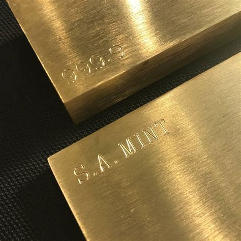 Set Of Two Gold Bar Style Brass Paperweights At 1stdibs