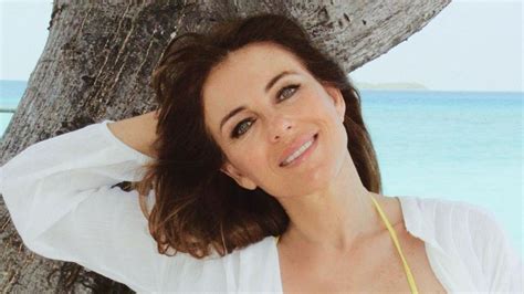 Elizabeth Hurley 58 Showcases Her Amazing Figure In A Plunging Yellow Bikini Hello