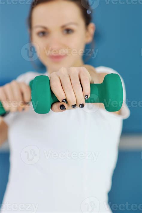 woman fitness workout with weights 11004108 Stock Photo at Vecteezy