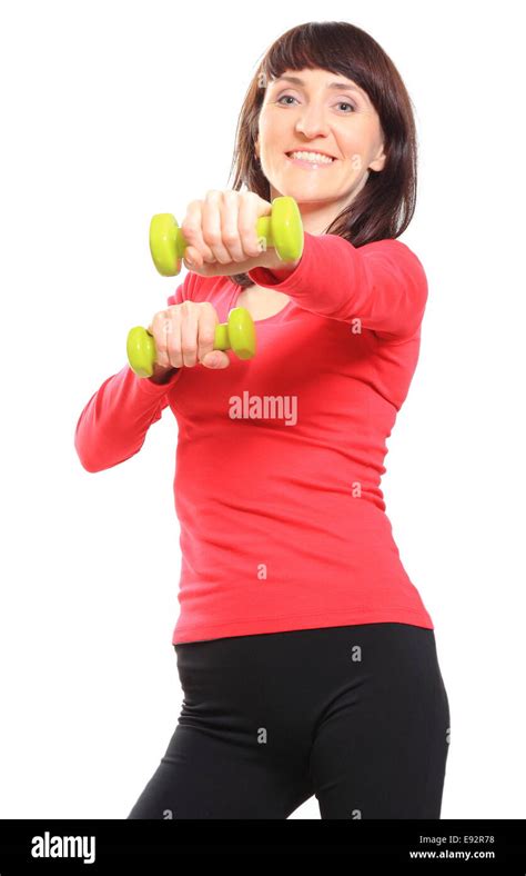 Brunette Woman During Fitness Exercise With Dumbbells Training With