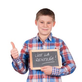 Free Photo | Boy holding slate on white space