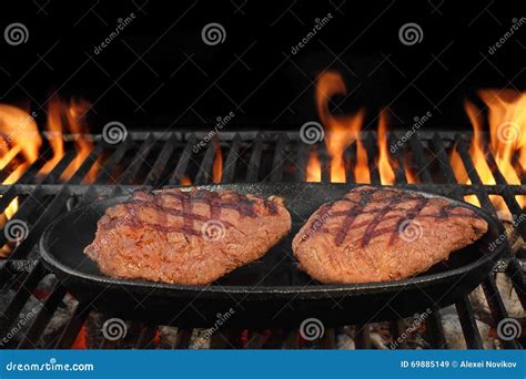 Two Beef Steaks On The Hot BBQ Flaming Grill Stock Image Image Of Flaming Fillet