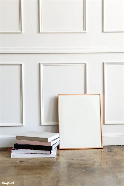 Blank Frame By A White Wall Premium Image By Felix