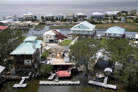 IN PHOTOS: Idalia leaves damage trail as storm moves into Atlantic ...