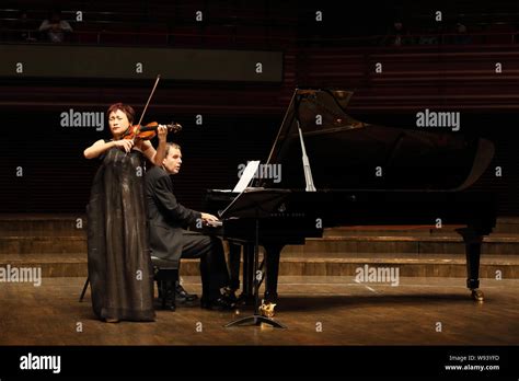 Korean Violinist Kyung Wha Chung Front Performs During A Concert In