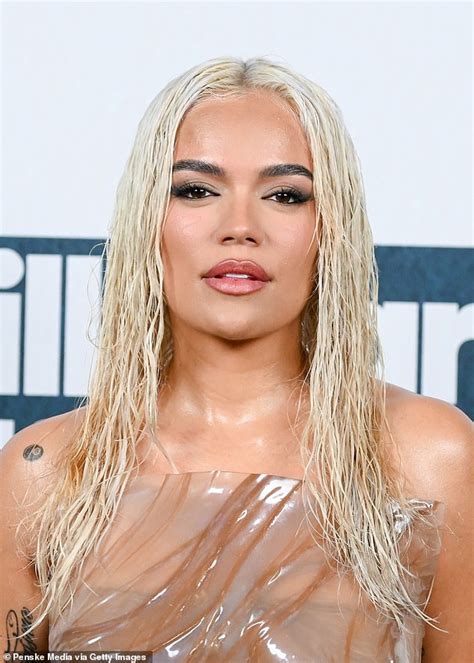 Karol G Leaves Nothing To The Imagination As She Goes Braless Beneath Bizarre Sheer Nude Mini