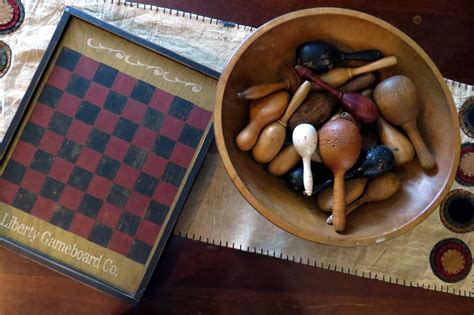 Old Wooden Bowl Filled With A Collection Of Sock Darners Can T Tell