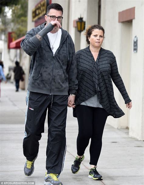 Baywatch's Yasmine Bleeth pulls on sneakers for stroll with husband ...