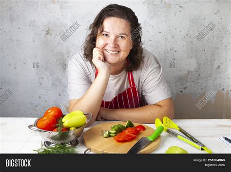 Woman Red Apron Sits Image And Photo Free Trial Bigstock