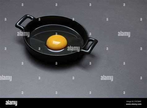 Cracked Egg In A Pan Hens Egg Stock Photo Alamy
