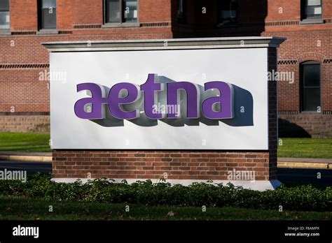 A Logo Sign Outside Of The Headquarters Of Aetna Inc In Hartford