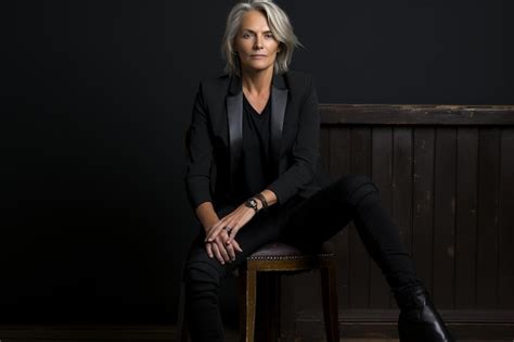 Premium Photo Elegant Mature Lady Sitting On A Chair