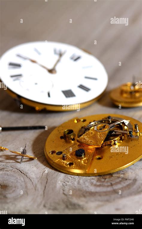 Antique watch parts Stock Photo - Alamy