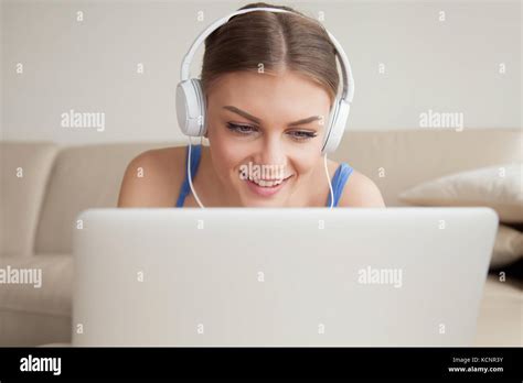 Smiling Young Woman Wearing Headphones Using Laptop Teen Girl Making