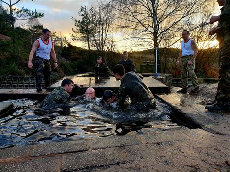 Royal Marines Recruits Being Introduced To The Infamous Sheep Dip