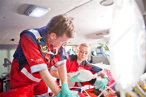 Paramedics Giving Patient Heart Massage Stock Image F0091542