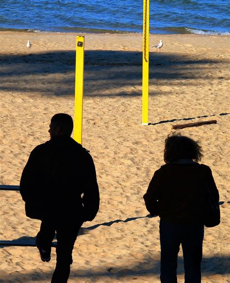 Yellow Poles On The Beach Hermit Pilgrim Flickr