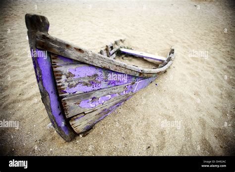 Color Picture Of An Abandoned Boat Stuck In Sand Stock Photo Alamy