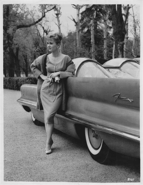 Debbie Reynolds Shown With The Lincoln Futura Concept Car Which