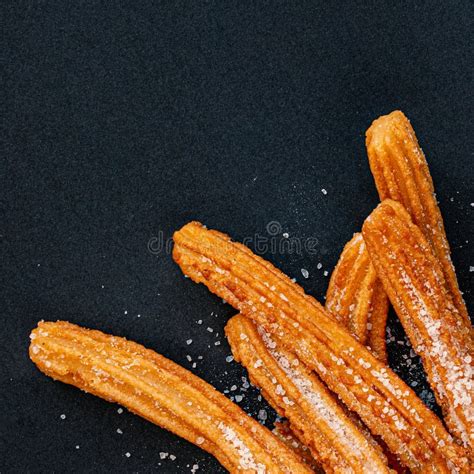 Churro On A Black Background Traditional Spanish Cusine Churros In A