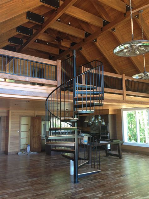 Gorgeous Spiral Staircase And A Vaulted Ceilinged Loft Spiral