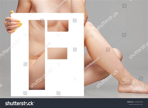 Nude Female Body Behind Stencil Letter Stock Photo Shutterstock