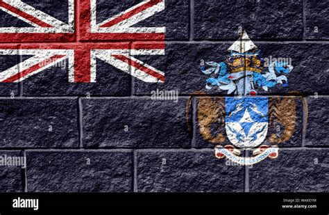 Flag Of Tristan Da Cunha Close Up Painted On A Cracked Wall Stock Photo