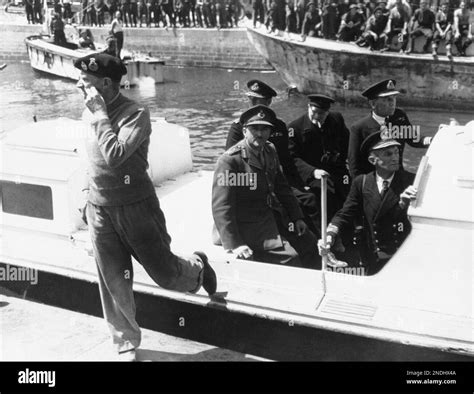 General Bernard Montgomery Left Steps Ashore From The Launch Bringing Britain S Prime Minister