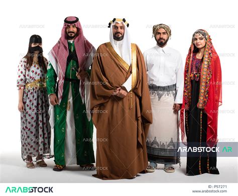 Portrait of a group of Saudi Arabian Gulf men and women wearing traditional Saudi traditional ...