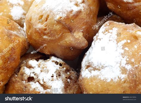 Traditional Dutch Oliebollen With Powdered Sugar Background Stock Photo ...