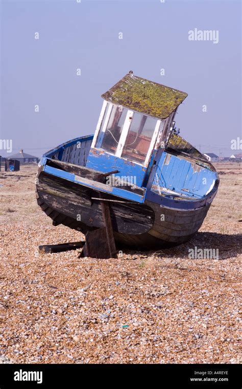 Back Of An Abandoned Fishing Boat On The Shingle Beach At Dungeness In