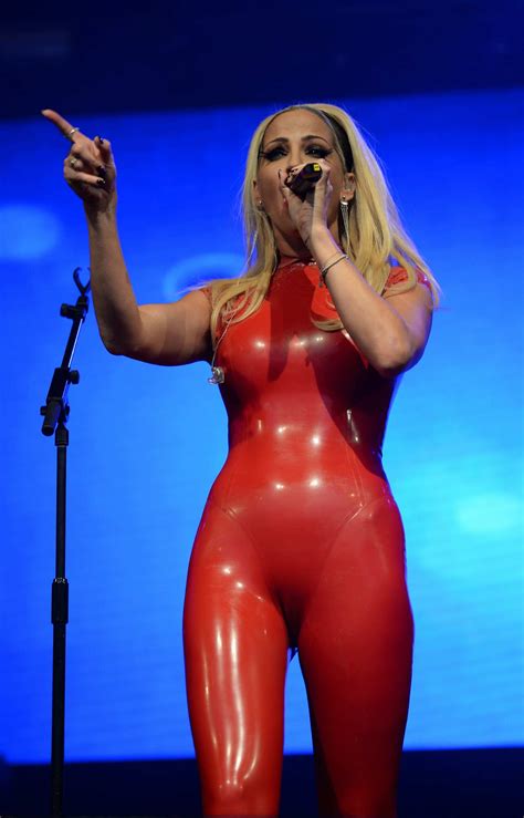 Sarah Harding Looks Stunning In Red Latex Outfit As She Performs At