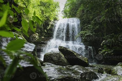 beautiful waterfall in rainforest 10844175 Stock Photo at Vecteezy