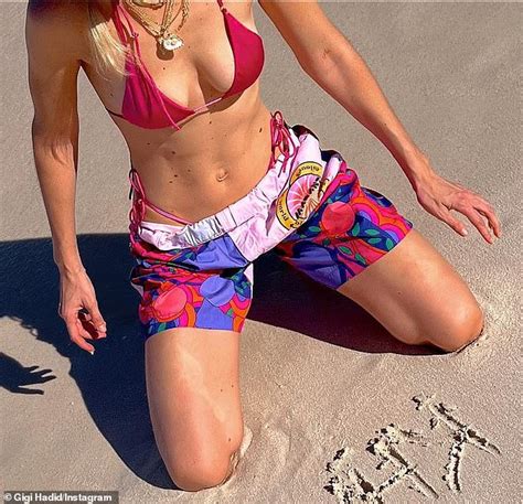 Gigi Hadid Wears A String Bikini While Soaking Up The Sun In Throwback Snaps Daily Mail Online