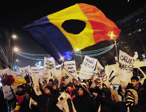 This Photo Shows A Romanian Flag With A Hole To Symbolise The 1989