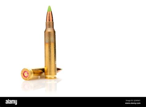 A Pair Of 556 Calibar Green Tip Bullets Ordered Into The Line On