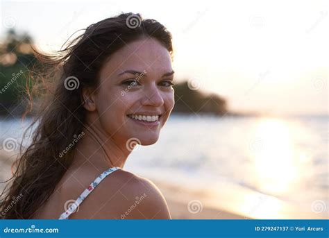 My Happiest Place Portrait Of A Beautiful Young Woman On The Beach