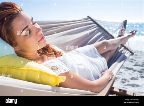 Brunette Relaxing In The Hammock Stock Photo Alamy