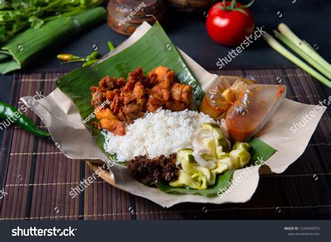nasi lemak ayam berempah traditional malay stock photo