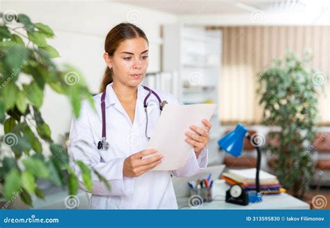 Female Doctor Standing In Hall Of Clinic Stock Photo Image Of Health