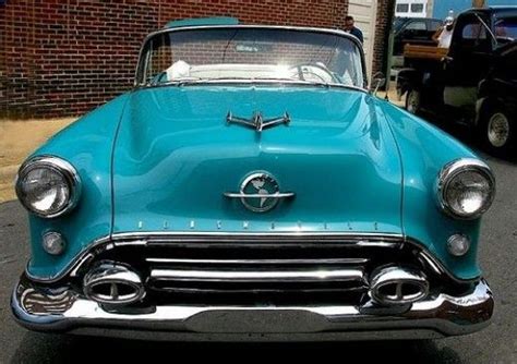 Plymouth Hood Ornament On Vintage American Classic Car