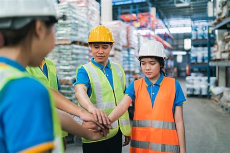 Premium Photo Group Of Industrial Warehouse Asian Worker In Safety