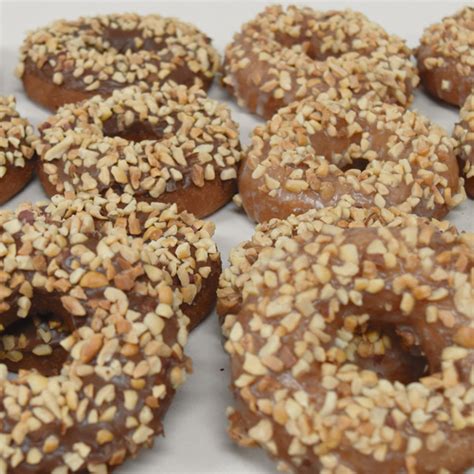 Peanut Donut Chocolate Donuts By The Dozen Bakery In Machesney Park