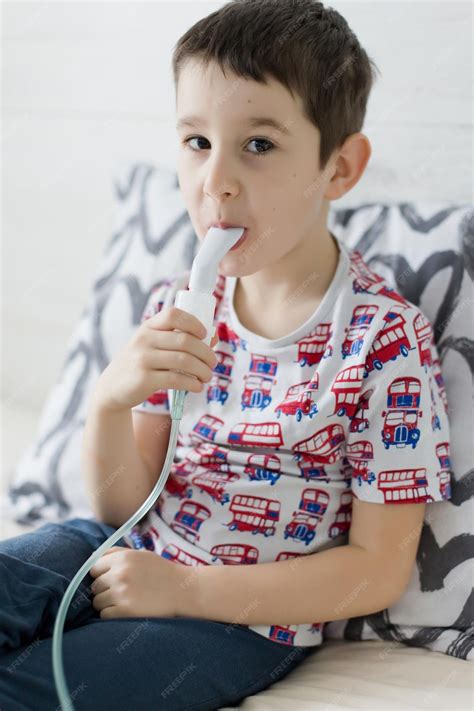 Premium Photo Caucasian Boy Making Inhalation With Nebulizer