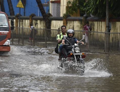 Rain Batters Mumbai Flooded Roads Rail Tracks Leave Commuters